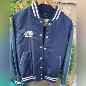 Roots varsity jacket with leather sleeves. Brand new with tags.